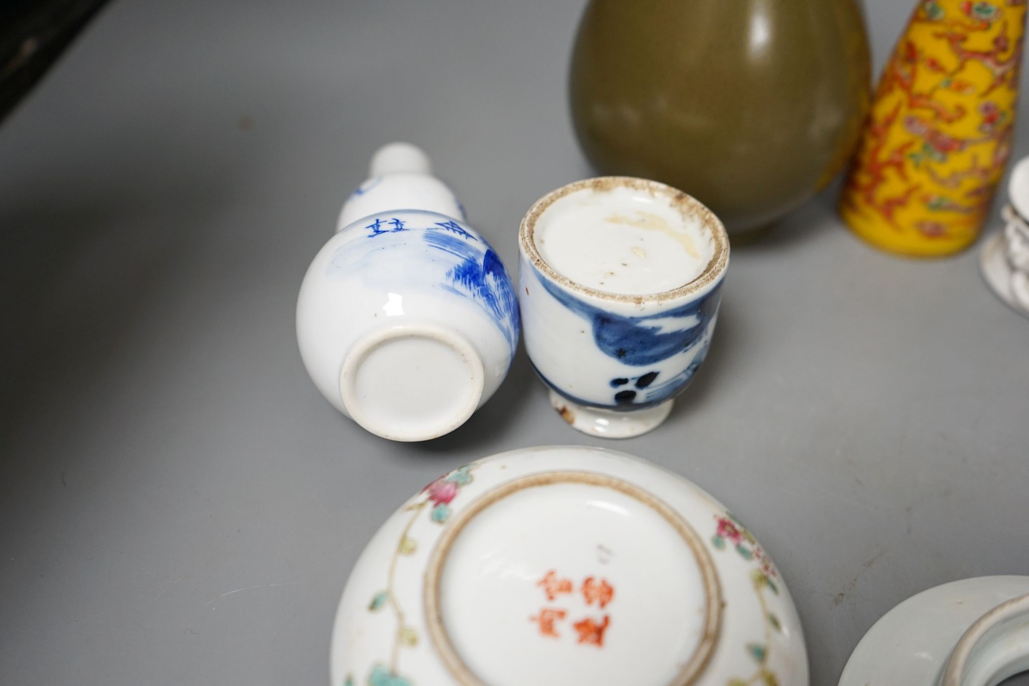 A group of Chinese ceramics including a tea dust vase, blanc de chine figure, famille rose box and cover etc., tallest 16cm